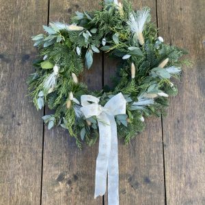 Wreath with cream bow and bunny tails